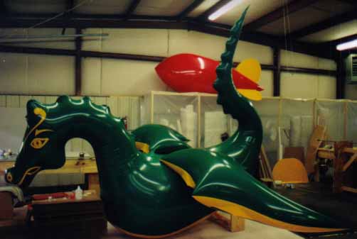 Flying Dragon - 15' custom helium shape. Advertising blimps work.